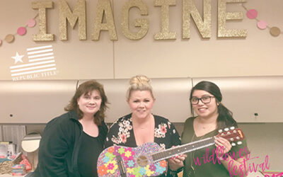 REPUBLIC TITLE DONATES GUITAR FOR ART AUCTION