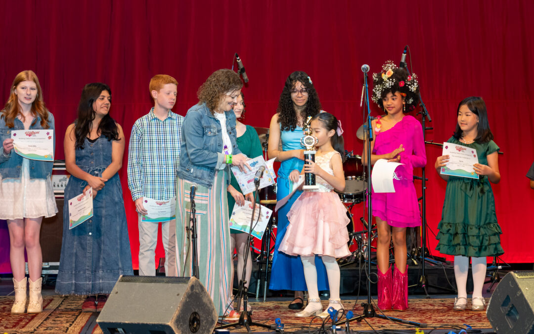 Anya Hu and Julie Hughes on stage at the Wildflower! Budding Talent Vocal Competition in Richardson