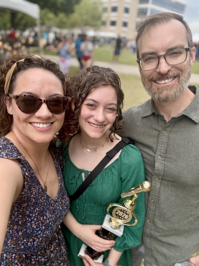 Haven Proffitt and parents at Wildflower Arts & Music Festival